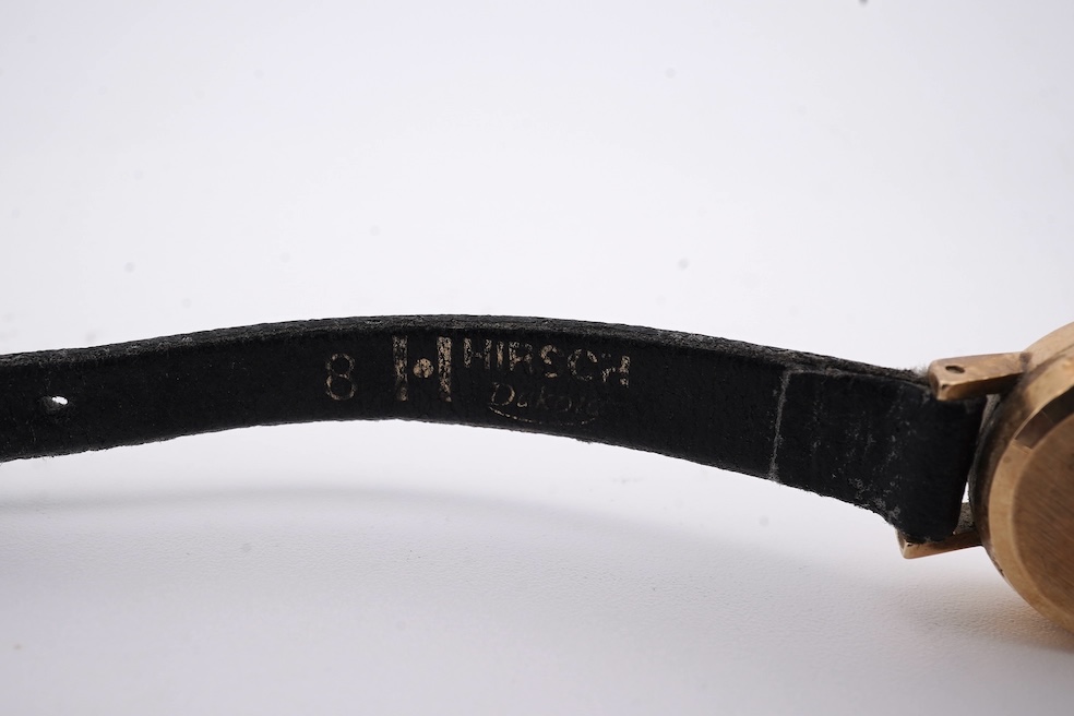 A lady's 9ct gold Omega Automatic wrist watch, on an associated leather strap, gross weight 11 grams. Condition - poor to fair